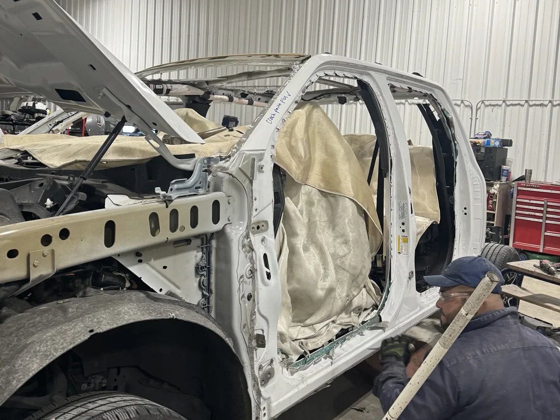 Prime CRS technician performing collision repair in the Houston shop